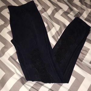 heavily distressed denim leggings
